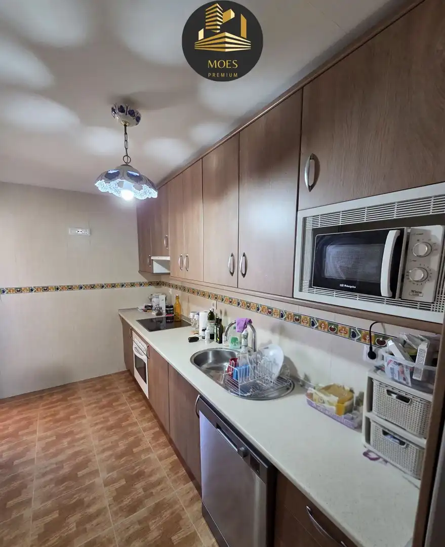 Kitchen of Flat for sale in Mengíbar  with Air Conditioner, Terrace and Storage room