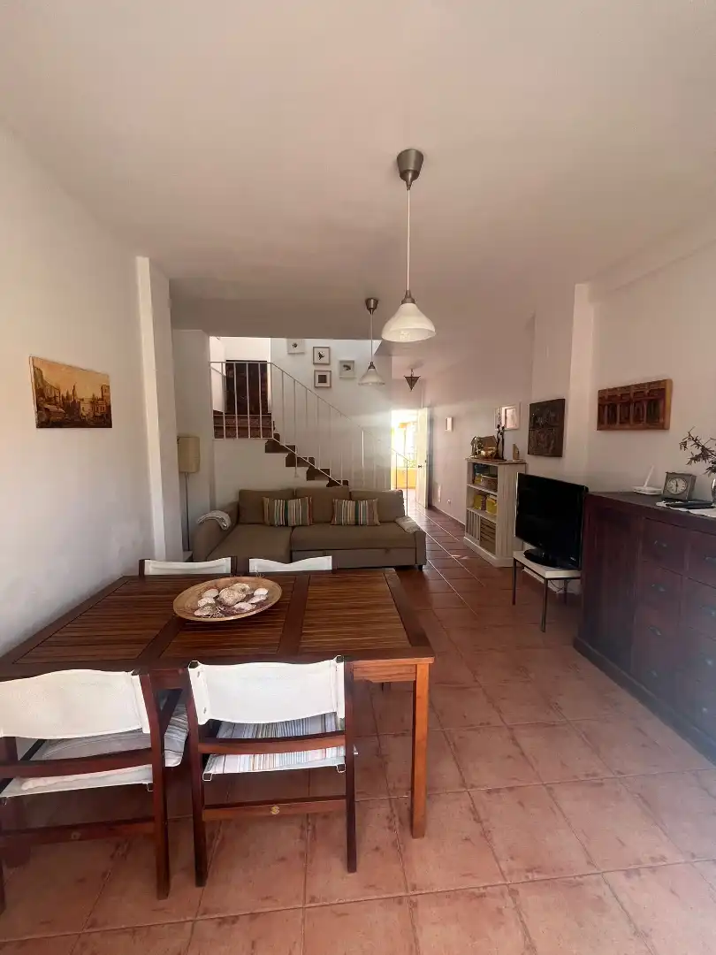 Sala de estar de Casa adosada en venta en Islantilla con Jardín privado, Trastero y Piscina comunitaria