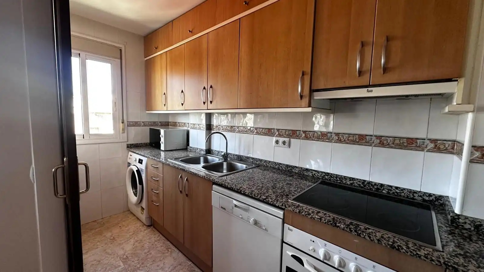 Kitchen of Flat for rent in Roquetes  with Heating, Terrace and Furnished