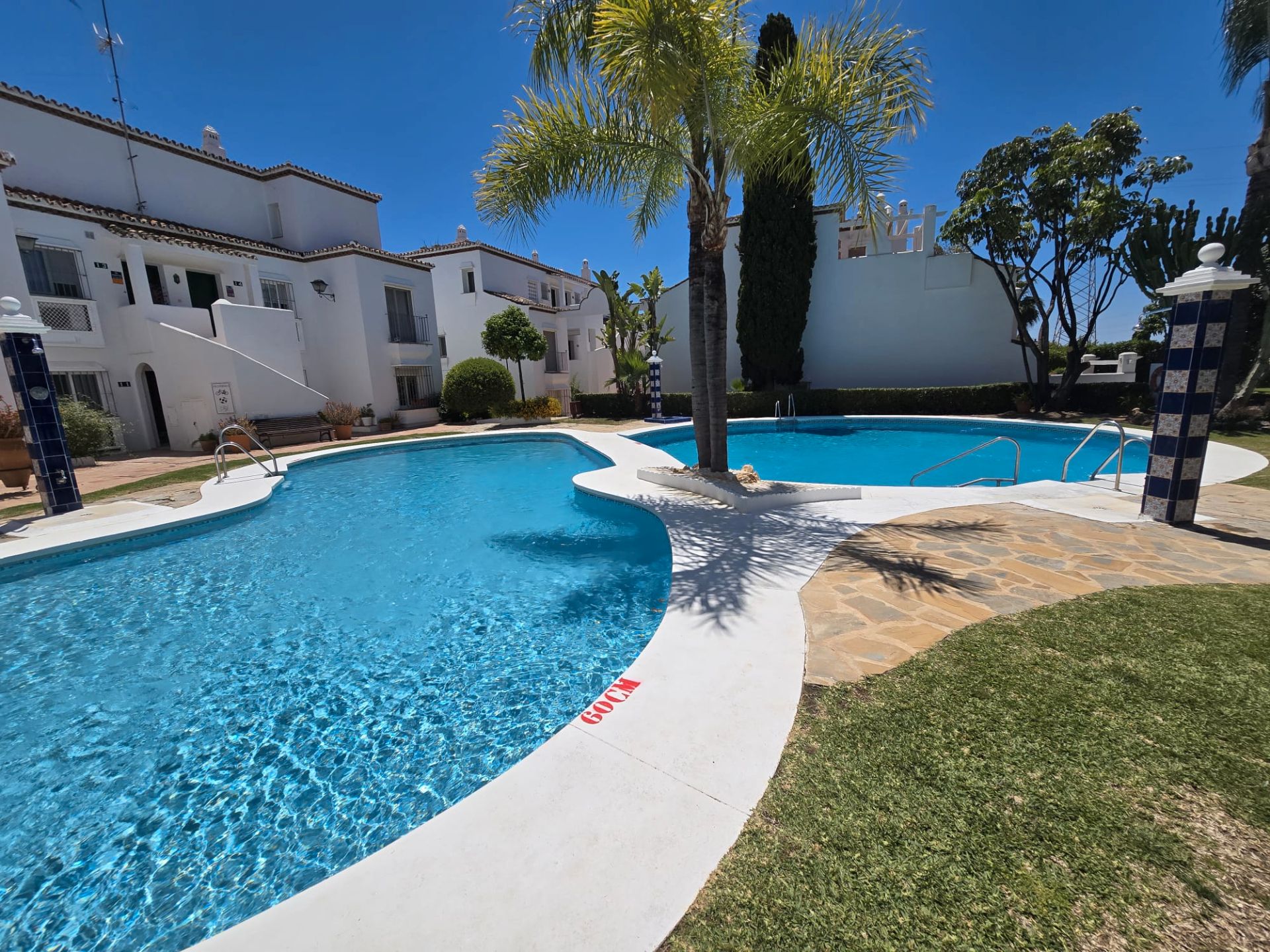 Swimming pool of Flat for sale in Marbella  with Air Conditioner, Terrace and Alarm