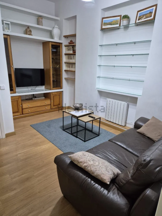 Sala d'estar de Apartament en venda en  Madrid Capital amb Aire condicionat, Calefacció i Parquet