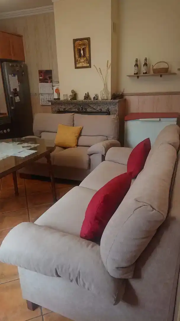 Sala d'estar de Casa adosada en venda en Jódar amb Aire condicionat i Balcó