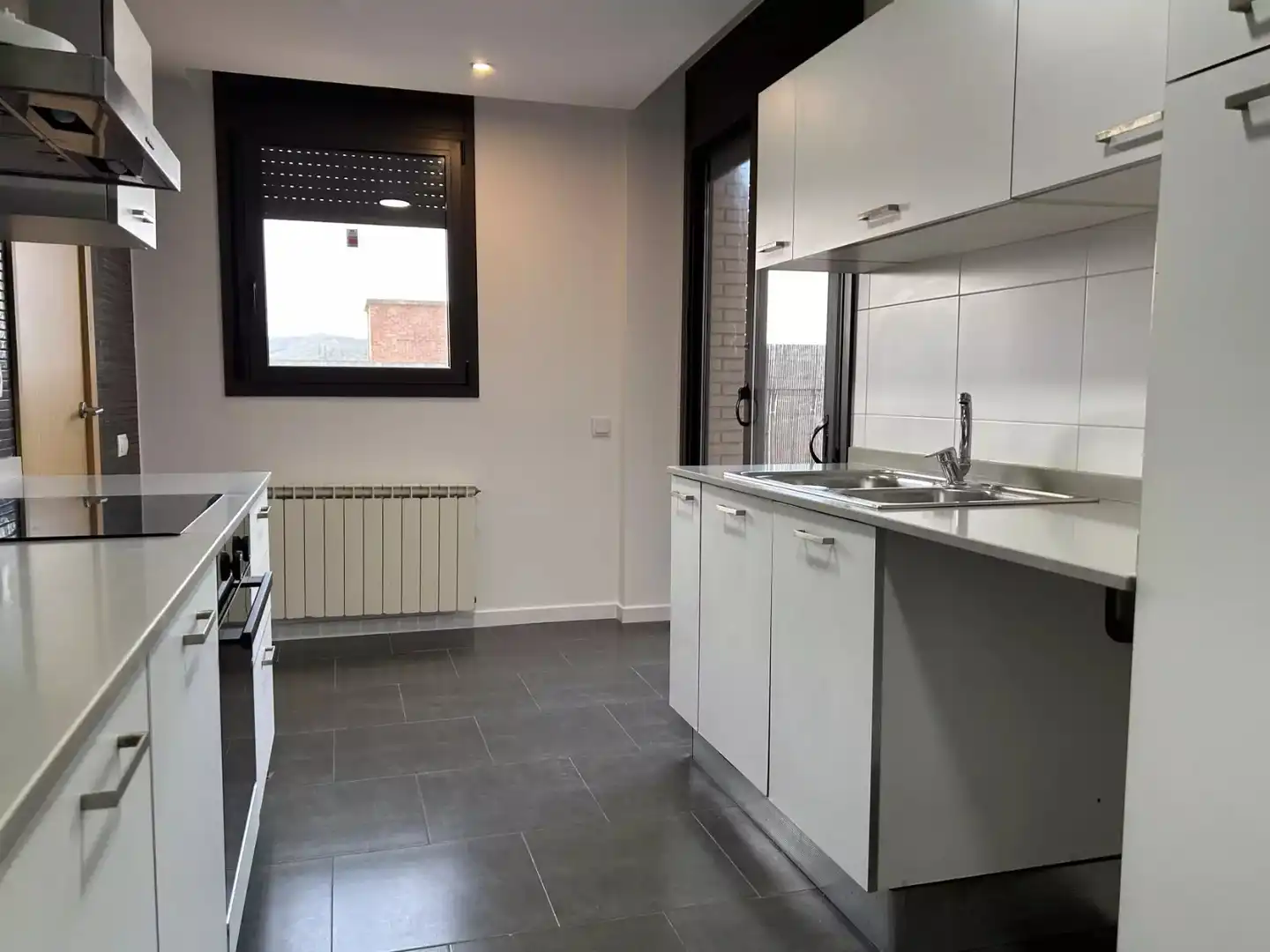 Kitchen of Flat for sale in Hostalric  with Parquet flooring, Terrace and Storage room