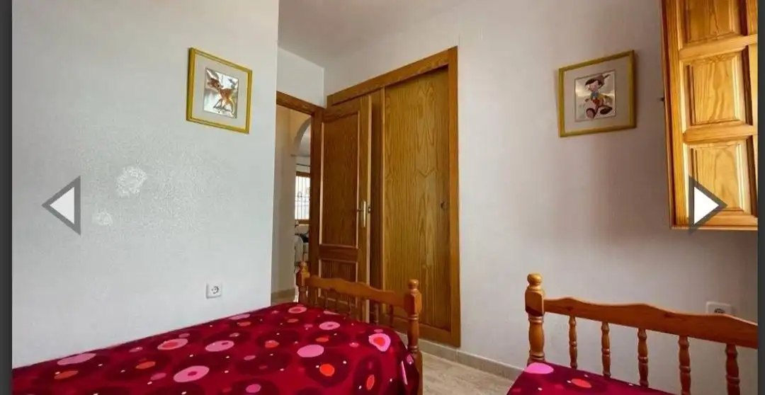Habitación de Casa adosada en venta en Pilar de la Horadada con Aire acondicionado, Calefacción y Jardín privado