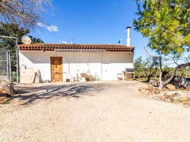 Casa rústica amb jardí en venda a Pego