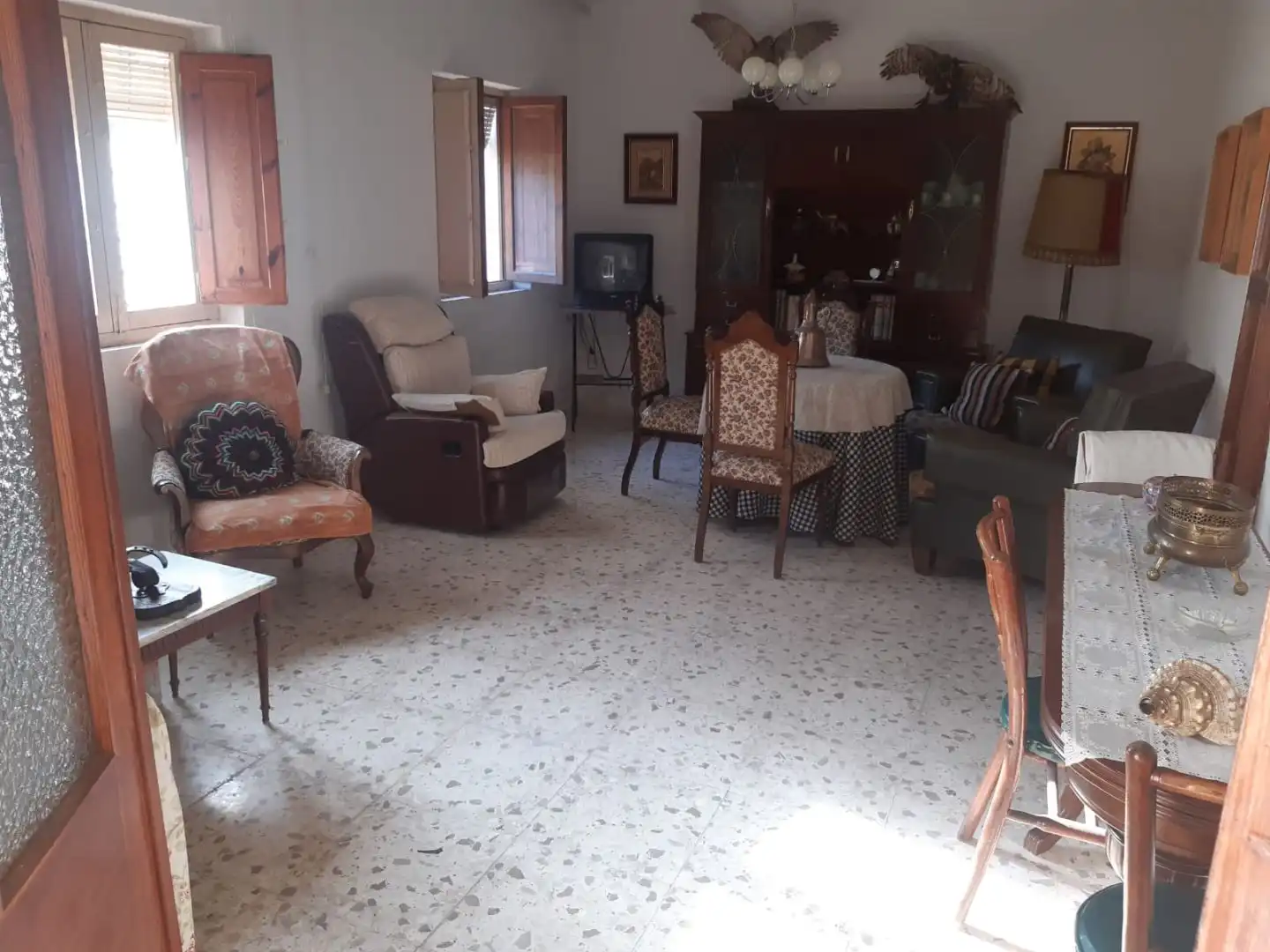Sala d'estar de Casa o xalet en venda en Baza amb Terrassa i Balcó