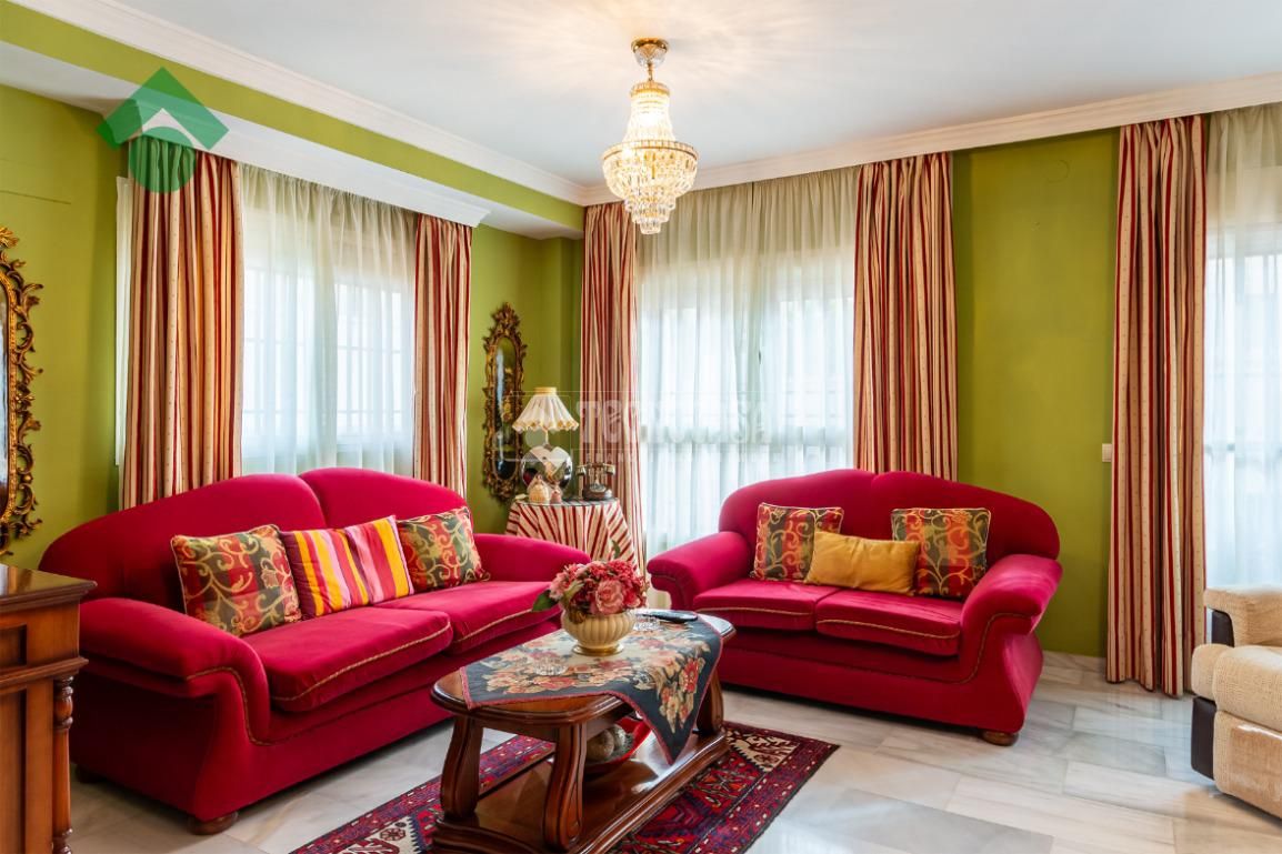 Sala d'estar de Casa adosada en venda en Vélez-Málaga amb Piscina comunitària