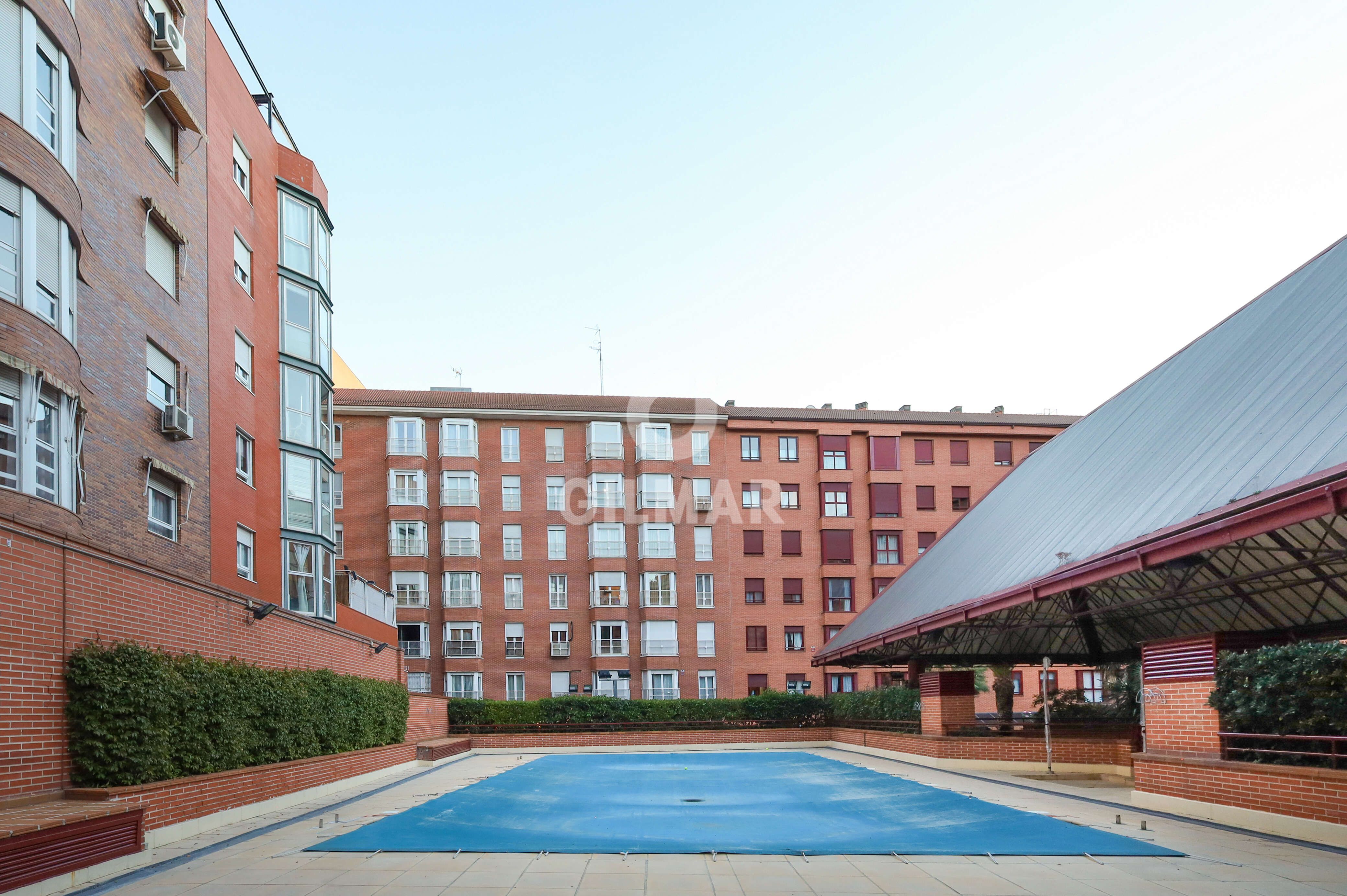 Exterior view of Flat for sale in  Madrid Capital  with Heating, Private garden and Swimming Pool
