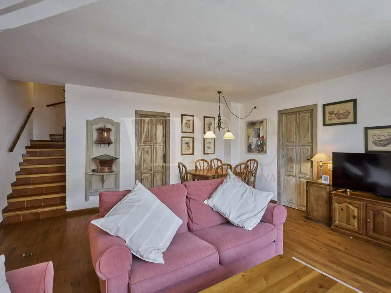 Sala de estar de Casa adosada en venta en Urús con Parquet y Terraza