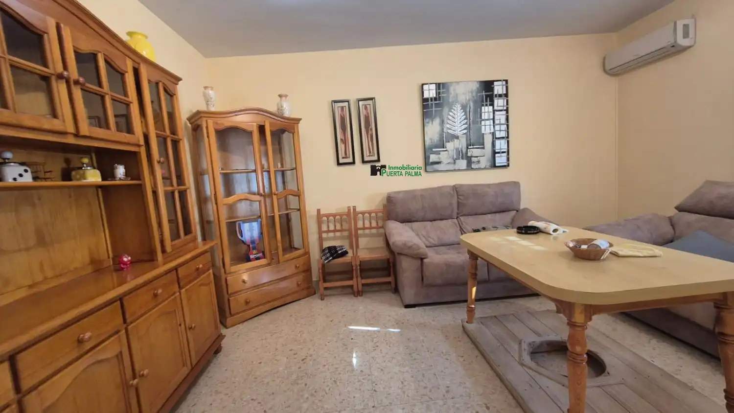 Sala d'estar de Casa adosada en venda en Talavera la Real amb Aire condicionat i Terrassa
