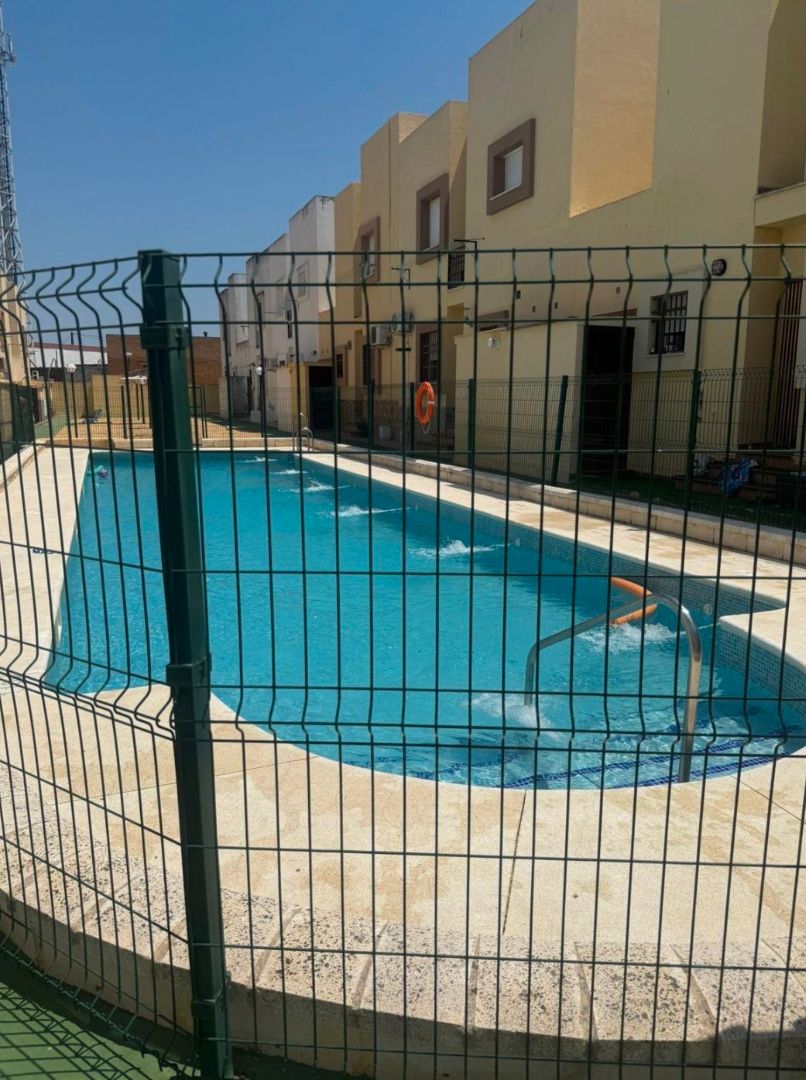 Swimming pool of Single-family semi-detached for sale in Niebla  with Air Conditioner, Terrace and Storage room