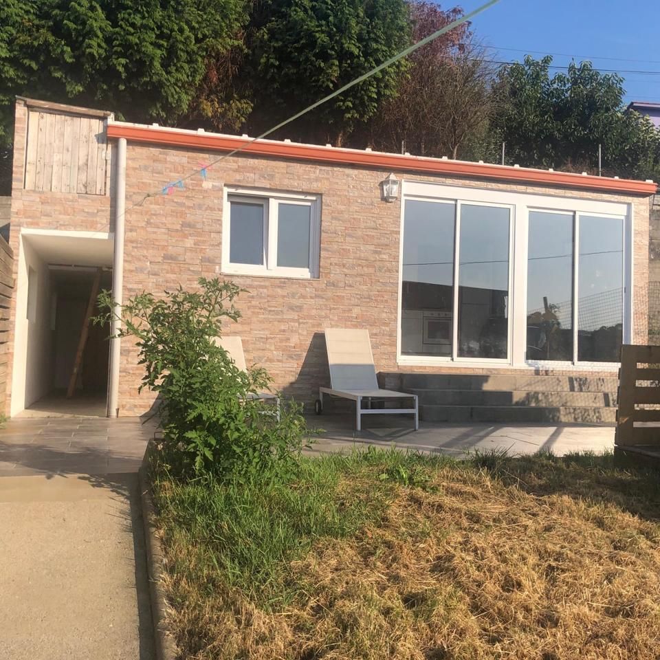 Vista exterior de Casa o xalet en venda en Culleredo amb Calefacció, Jardí privat i Terrassa