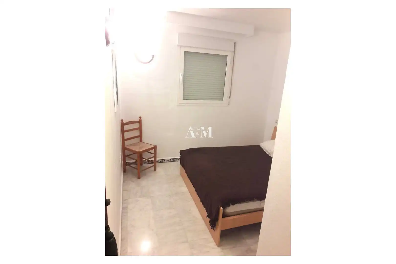 Dormitori de Pis de lloguer en Torrevieja amb Aire condicionat, Terrassa i Piscina