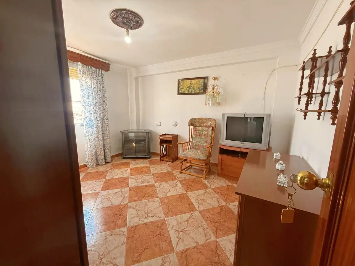 Sala de estar de Casa adosada en venta en Benamejí con Jardín privado, Terraza y Trastero