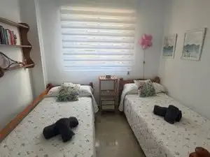 Dormitori de Pis de lloguer en Almuñécar amb Aire condicionat, Terrassa i Moblat