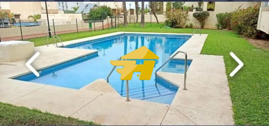 Piscina de Pis de lloguer en Torremolinos amb Aire condicionat, Jardí privat i Piscina