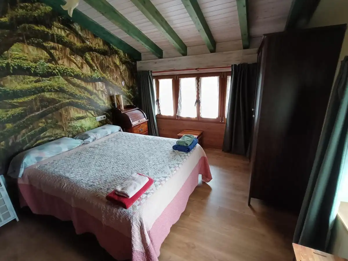 Dormitori de Casa adosada en venda en Llanes amb Calefacció, Jardí privat i Terrassa