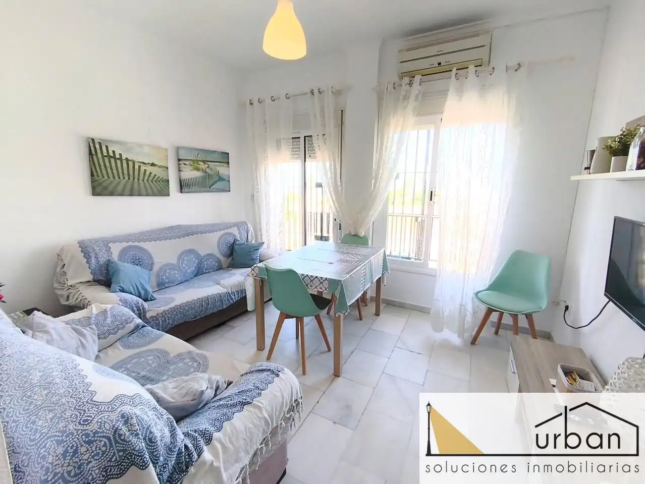 Sala de estar de Piso en venta en Chipiona con Aire acondicionado, Terraza y Amueblado