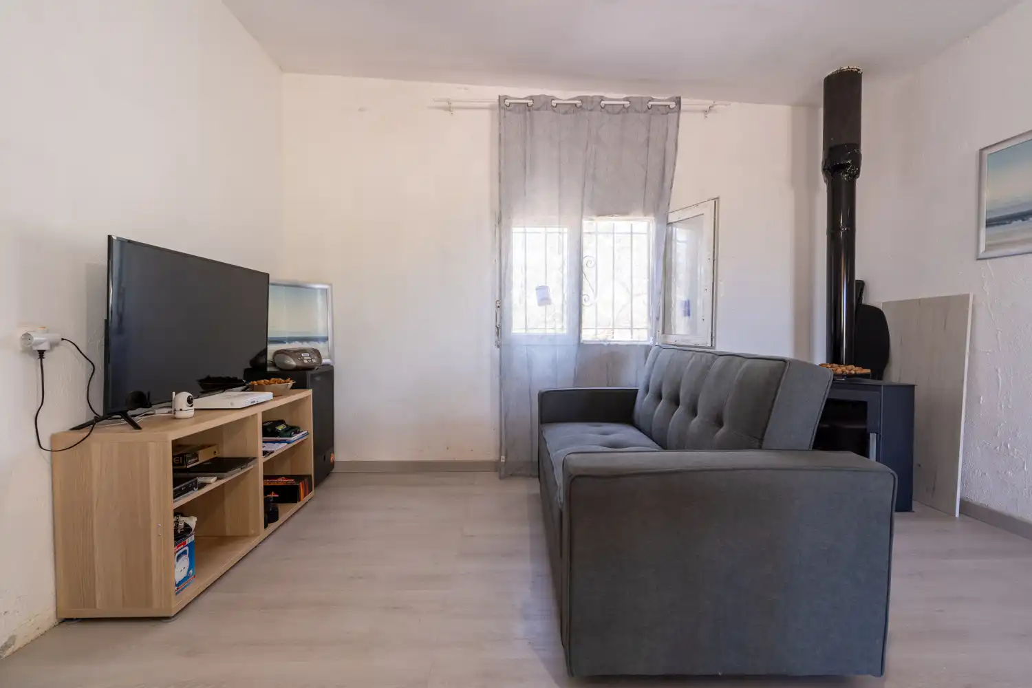 Sala de estar de Finca rústica en venta en L'Aldea con Terraza y Amueblado