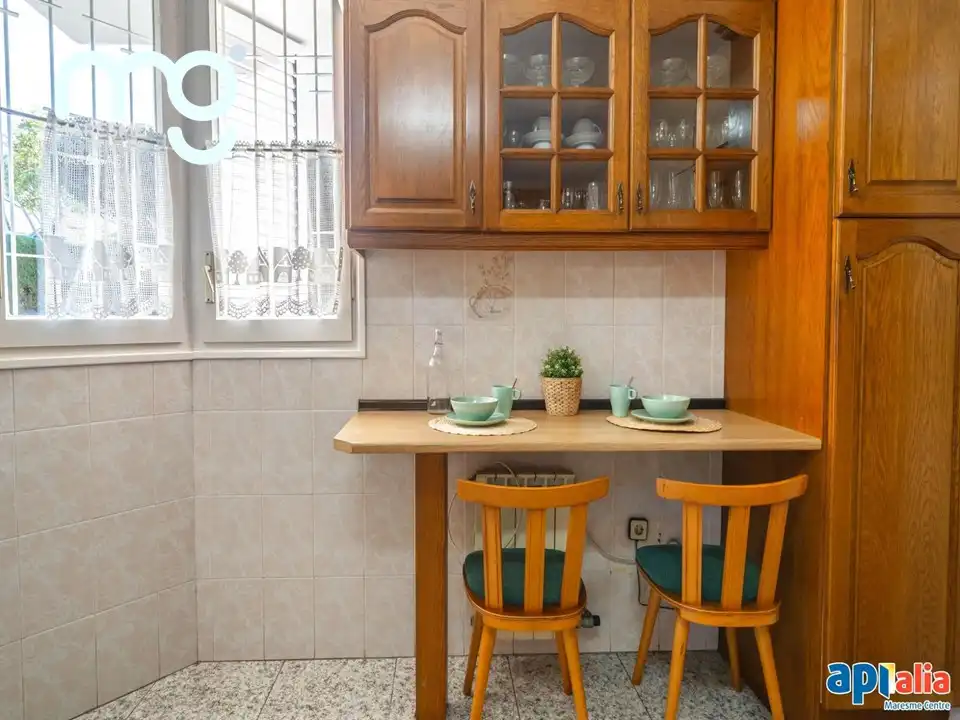 Cuina de Casa adosada en venda en El Masnou amb Calefacció, Jardí privat i Terrassa