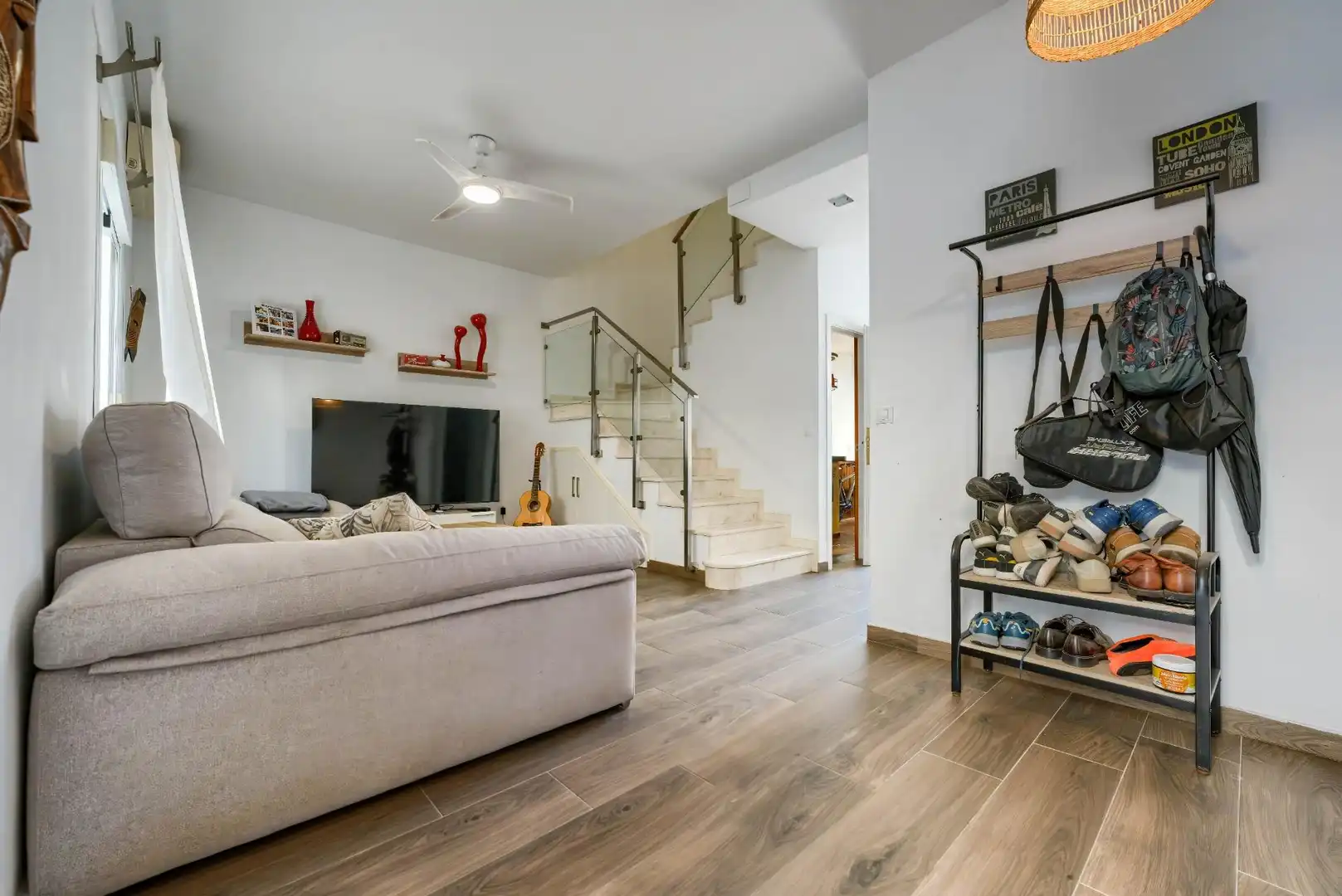 Sala de estar de Casa adosada en venta en Umbrete con Aire acondicionado, Terraza y Trastero