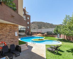 Swimming pool of Attic for sale in  Granada Capital  with Heating, Private garden and Terrace