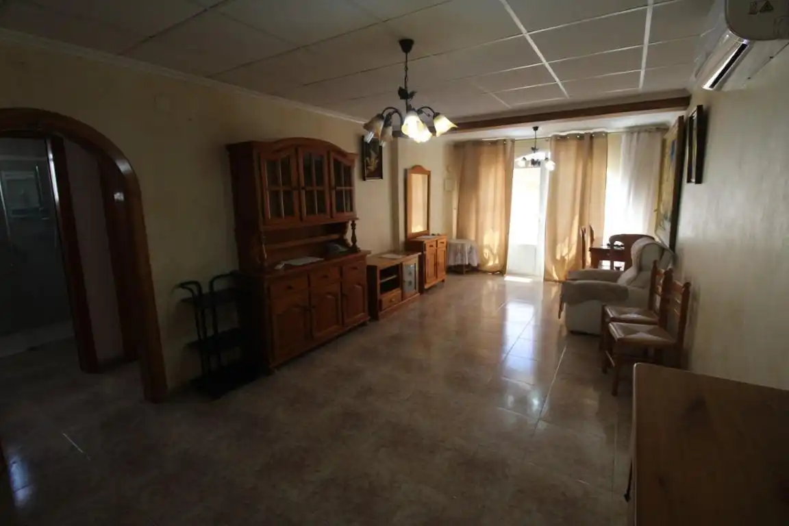 Sala de estar de Casa adosada en venta en Torrevieja con Aire acondicionado, Jardín privado y Terraza