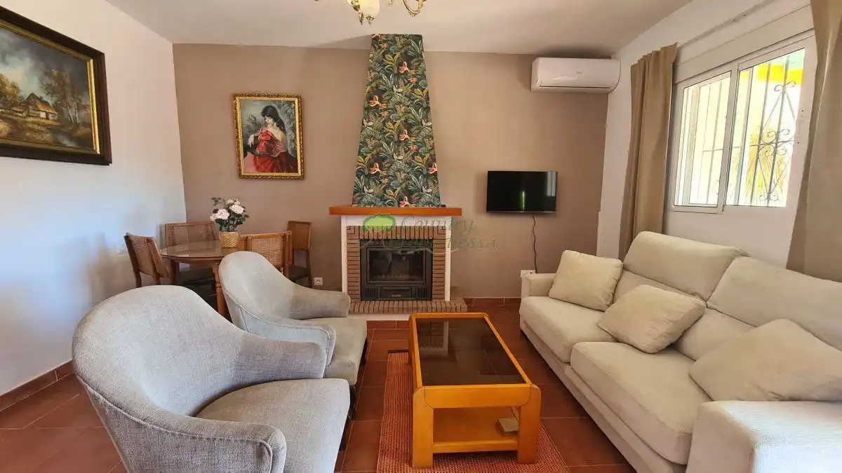 Sala de estar de Finca rústica en venta en Vélez-Málaga con Aire acondicionado, Jardín privado y Terraza