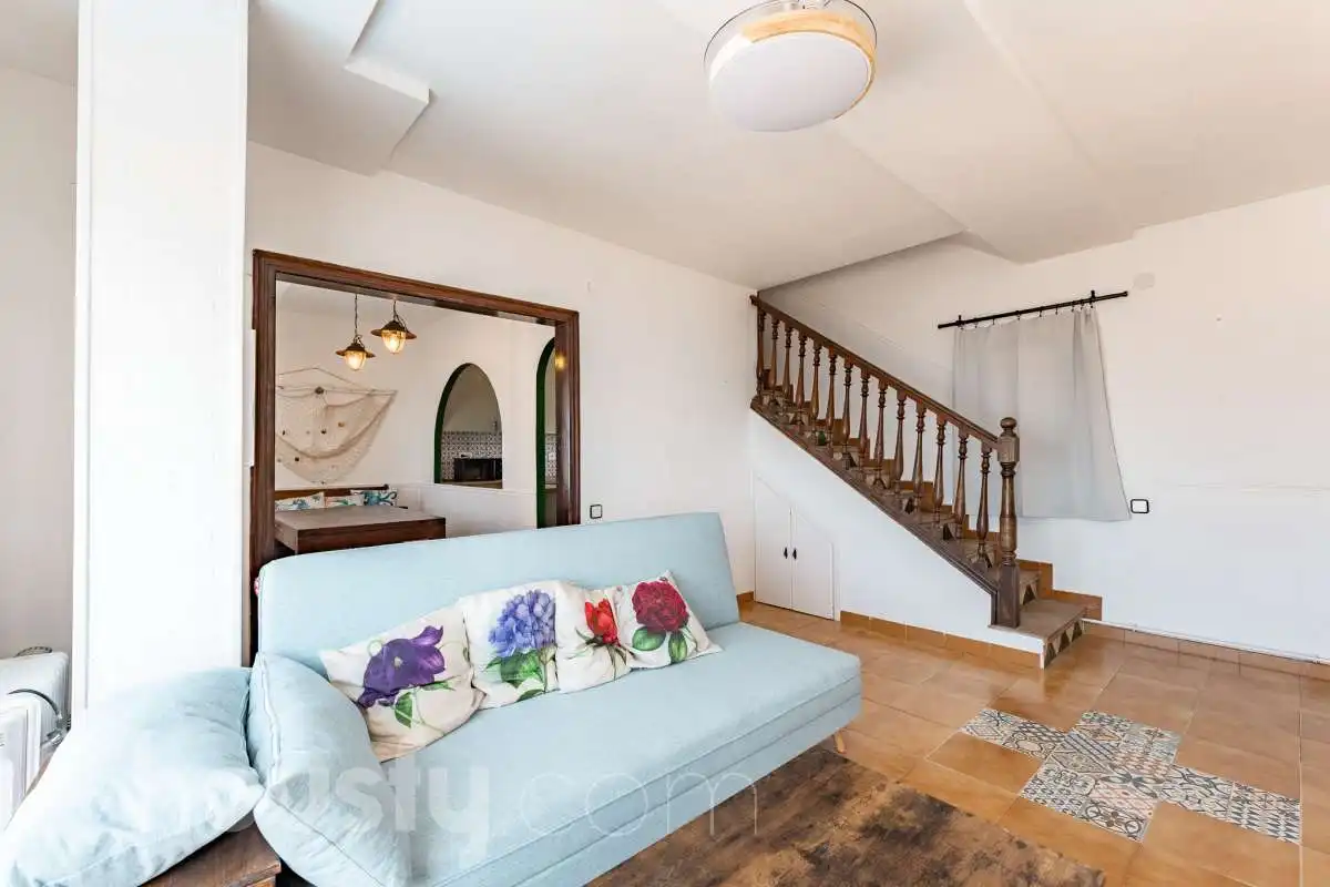Sala de estar de Piso en venta en Sitges con Trastero, Amueblado y Piscina comunitaria