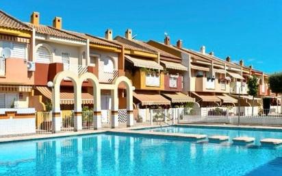 Vista exterior de Casa adosada en venda en San Javier amb Aire condicionat, Jardí privat i Terrassa