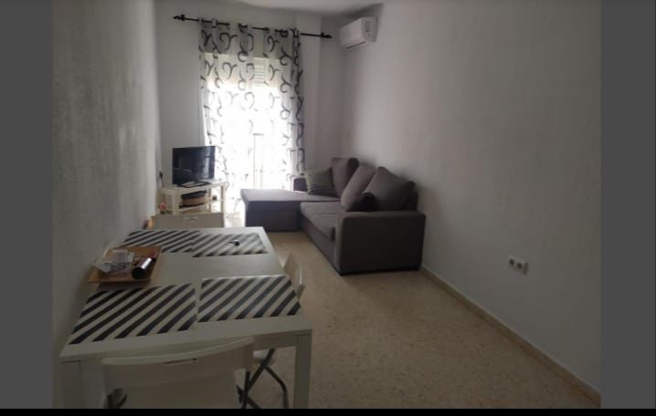 Living room of Flat for sale in Sanlúcar de Barrameda  with Air Conditioner, Furnished and Oven