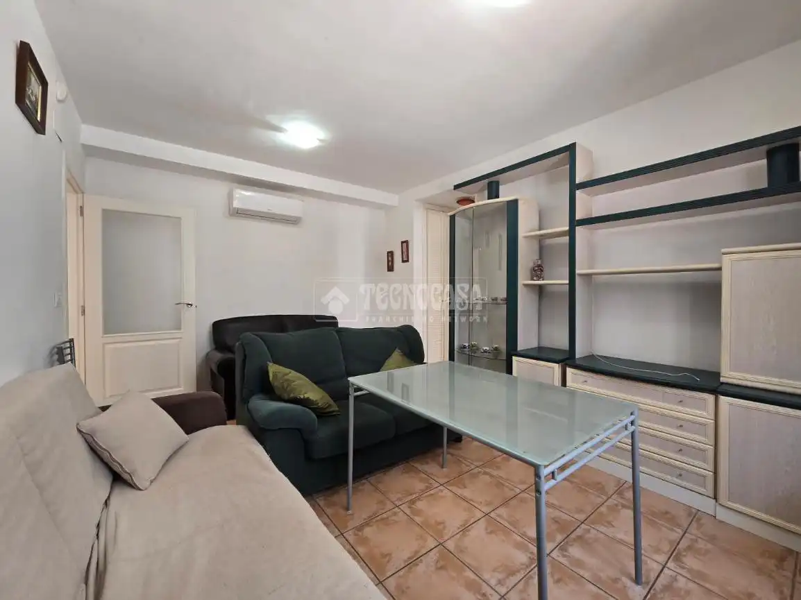 Sala de estar de Piso en venta en Vélez de Benaudalla con Aire acondicionado, Terraza y Piscina comunitaria