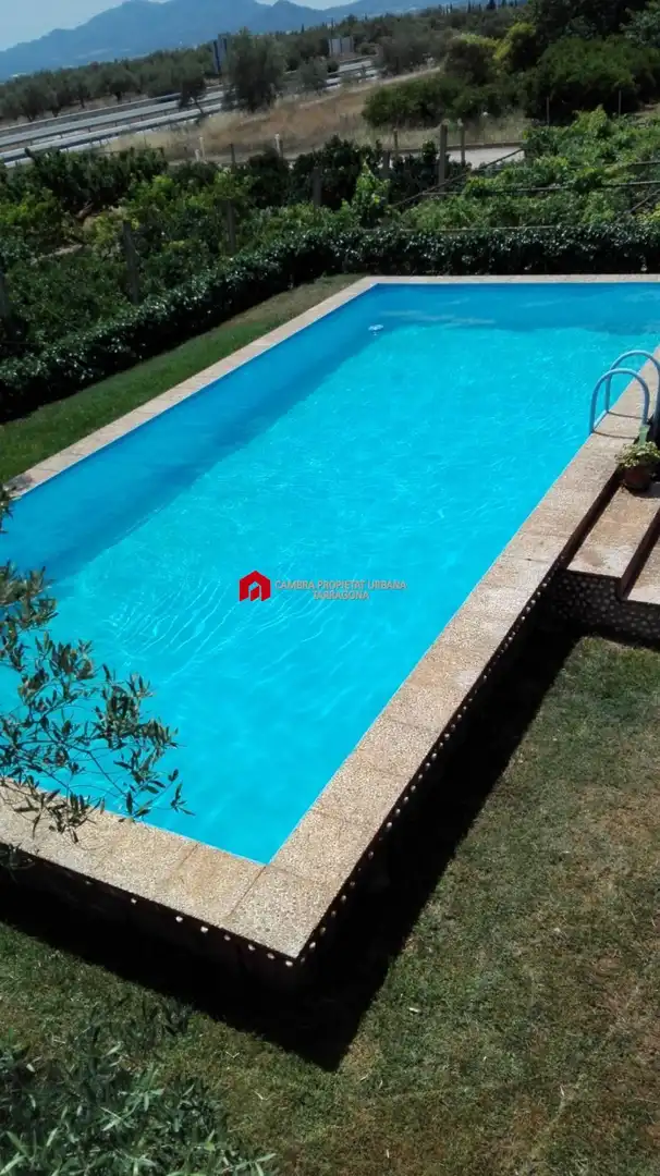 Swimming pool of Country homes for sale in L'Aldea  with Air Conditioner, Heating and Private garden