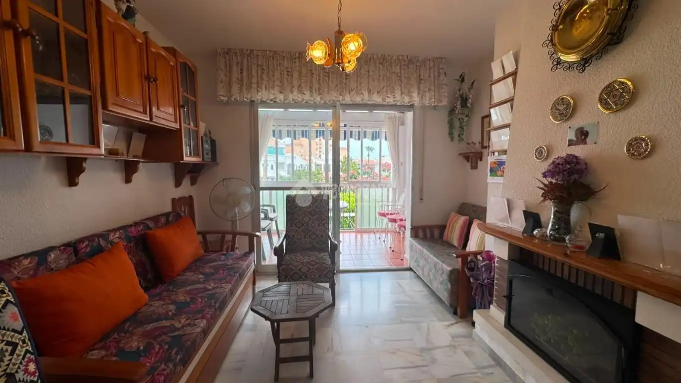 Sala de estar de Dúplex en venta en Motril con Terraza, Piscina y Piscina comunitaria