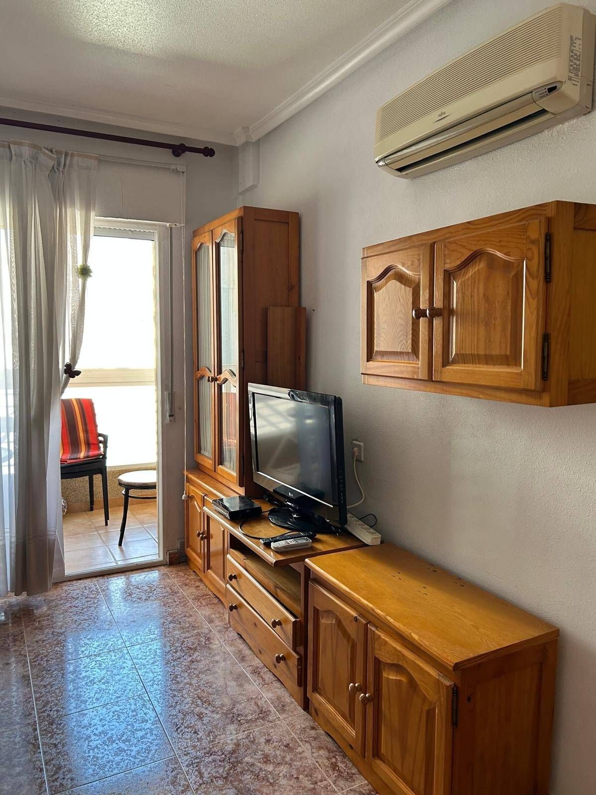 Living room of Flat for sale in Torrevieja  with Air Conditioner, Heating and Private garden
