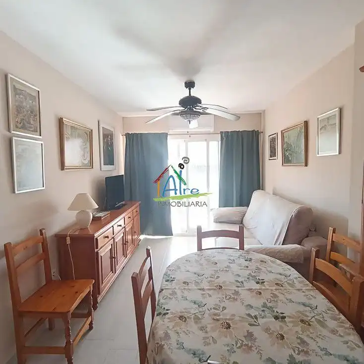 Sala d'estar de Apartament en venda en Almonte amb Aire condicionat, Terrassa i Piscina comunitària
