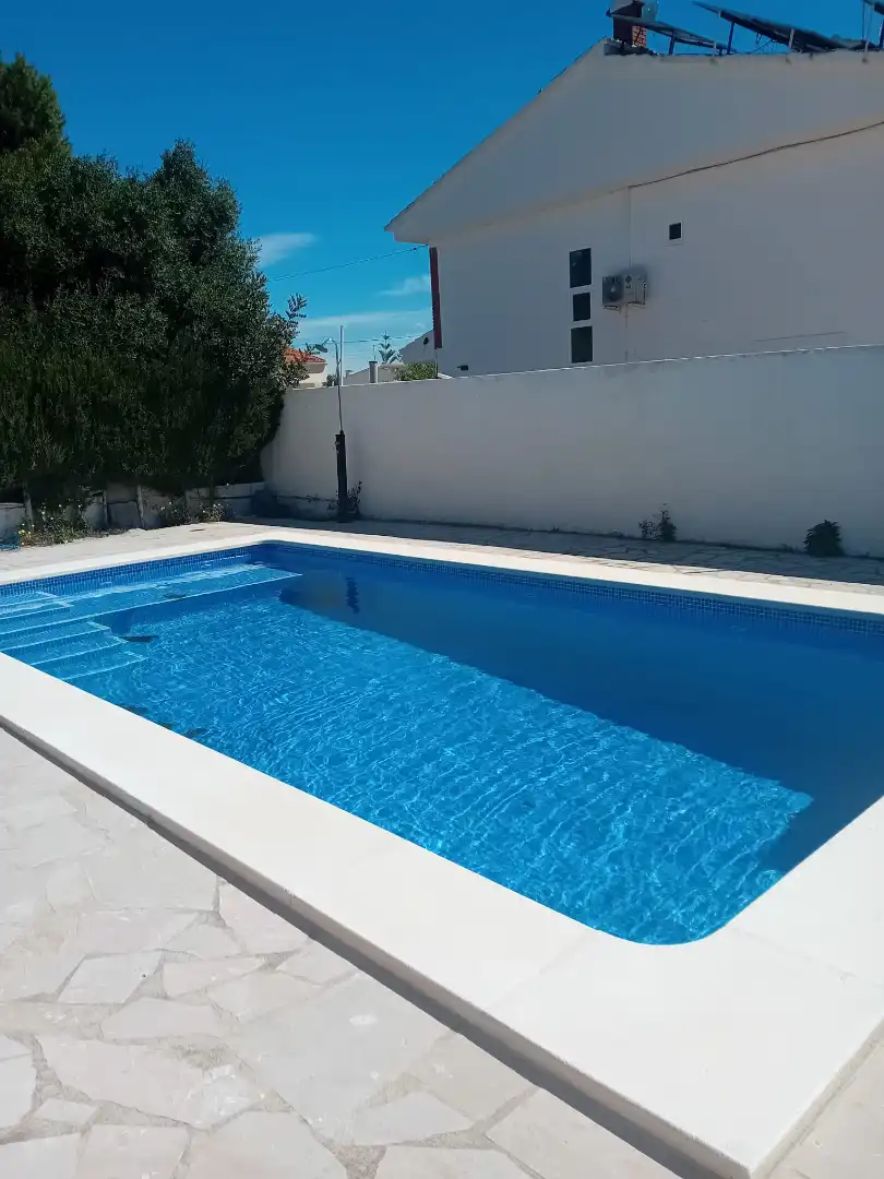 Schwimmbecken von Einfamilien-Reihenhaus zum Verkauf in L'Ametlla de Mar  mit Klimaanlage, Terrasse und Schwimmbad