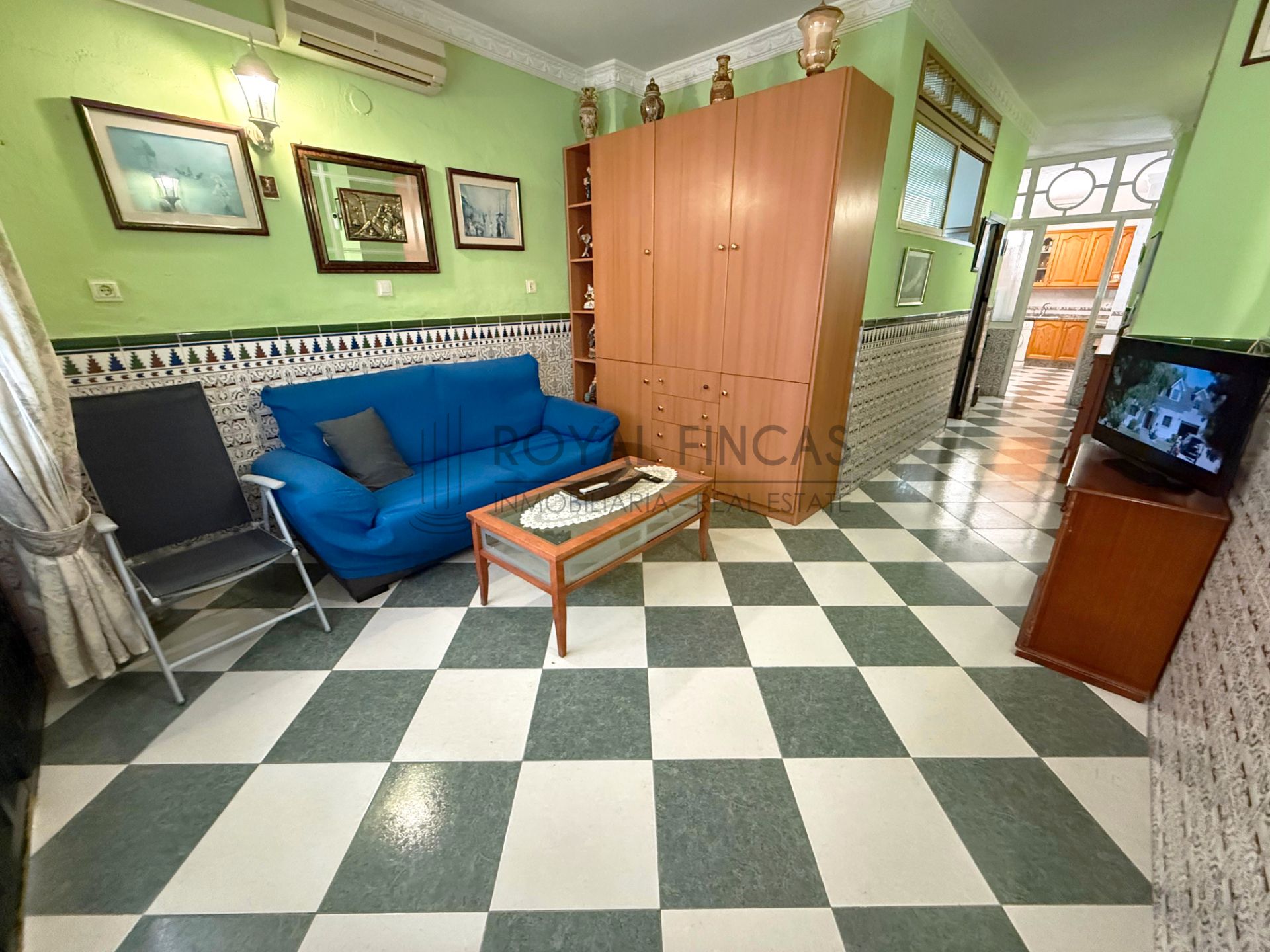 Sala de estar de Casa adosada en venta en Benalmádena con Aire acondicionado, Terraza y Trastero
