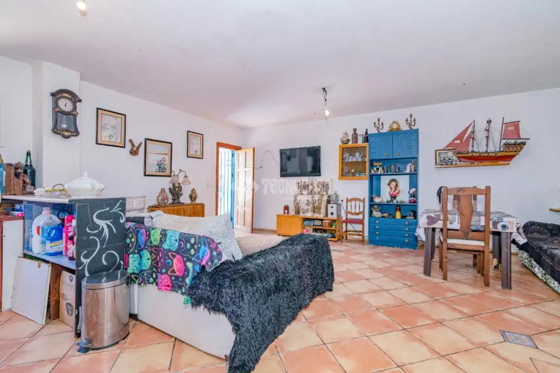 Sala d'estar de Casa adosada en venda en La Zubia amb Terrassa i Piscina comunitària