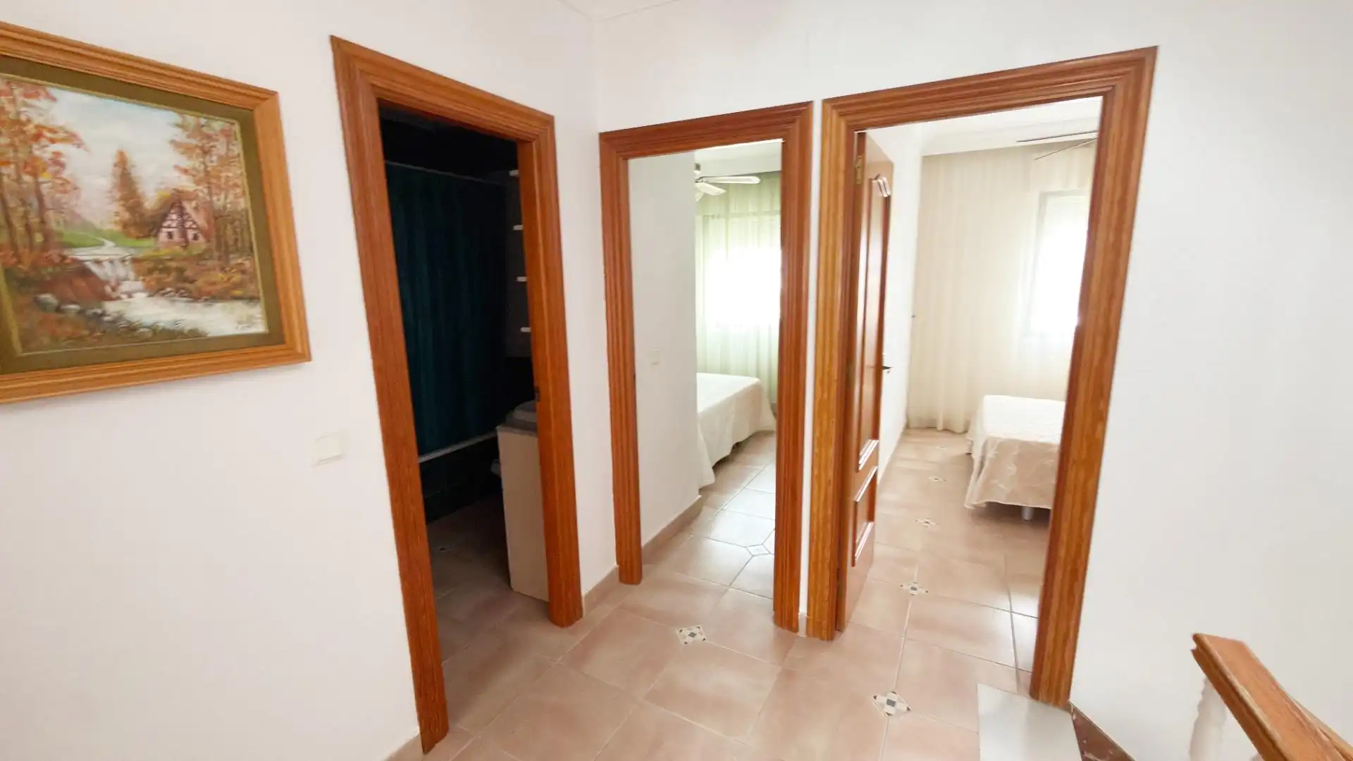 Habitación de Casa adosada de alquiler en Punta Umbría con Terraza y Piscina comunitaria