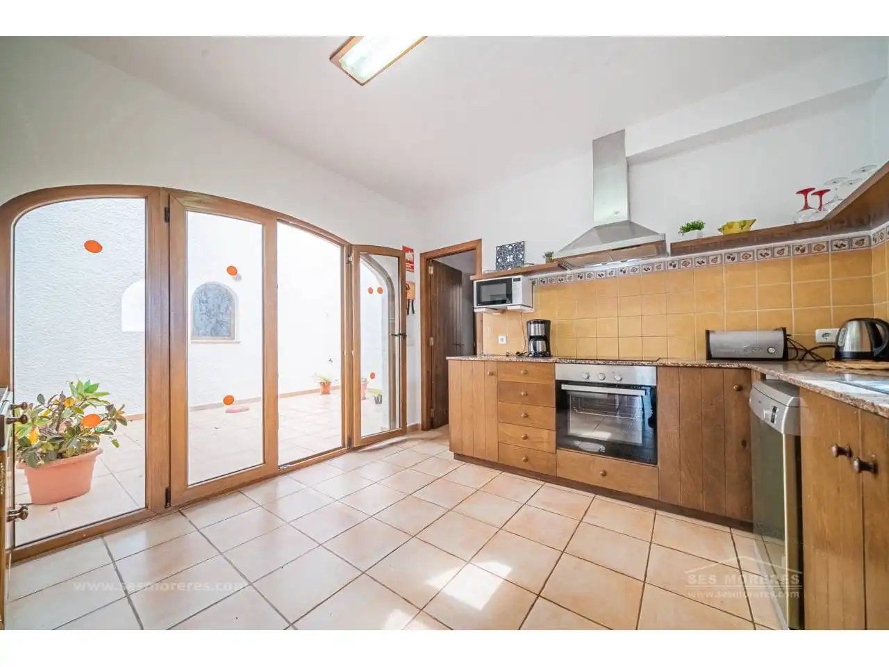 Cocina de Finca rústica en venta en Ferreries con Aire acondicionado, Jardín privado y Terraza