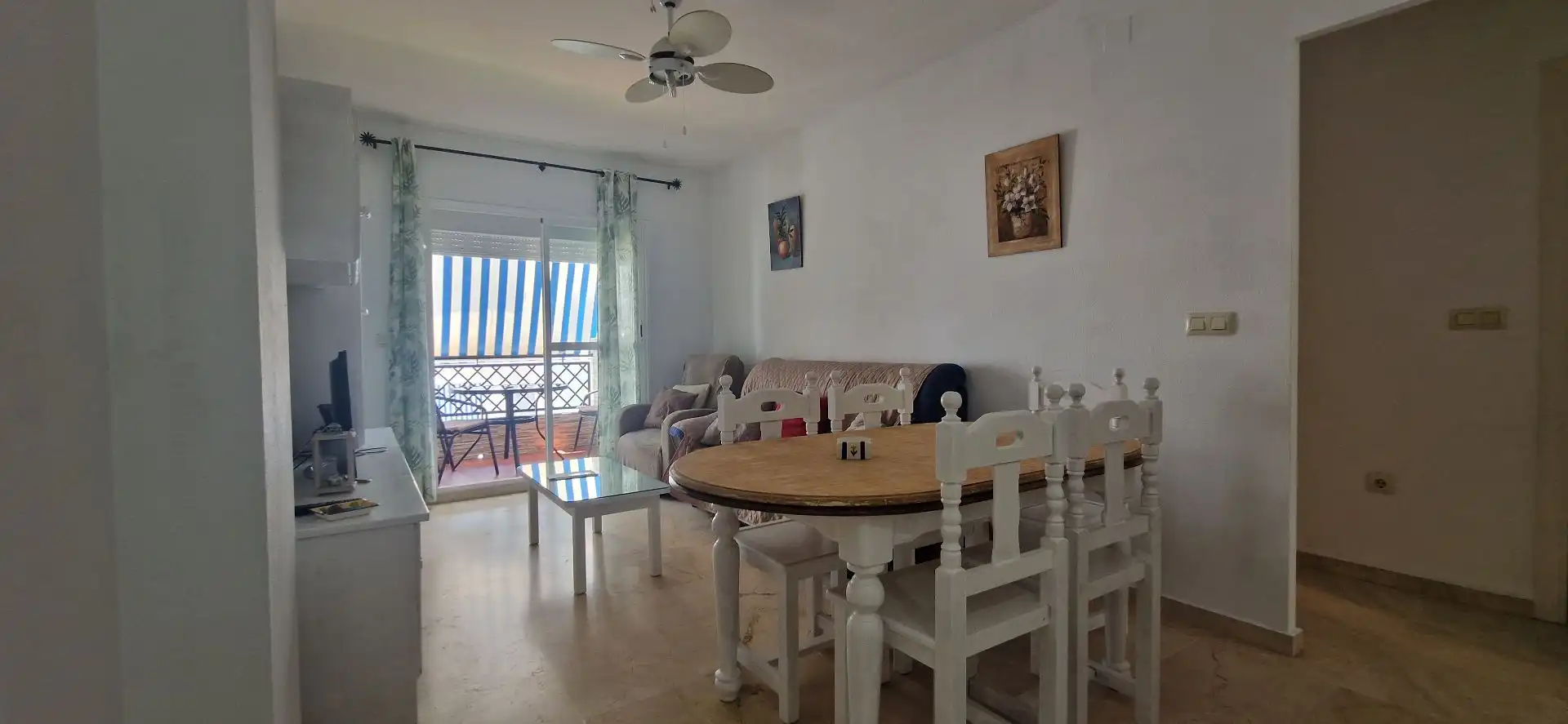 Menjador de Apartament de lloguer en El Portil amb Moblat i Piscina comunitària