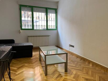 Living room of Planta baja for sale in  Madrid Capital  with Air Conditioner, Parquet flooring and Terrace