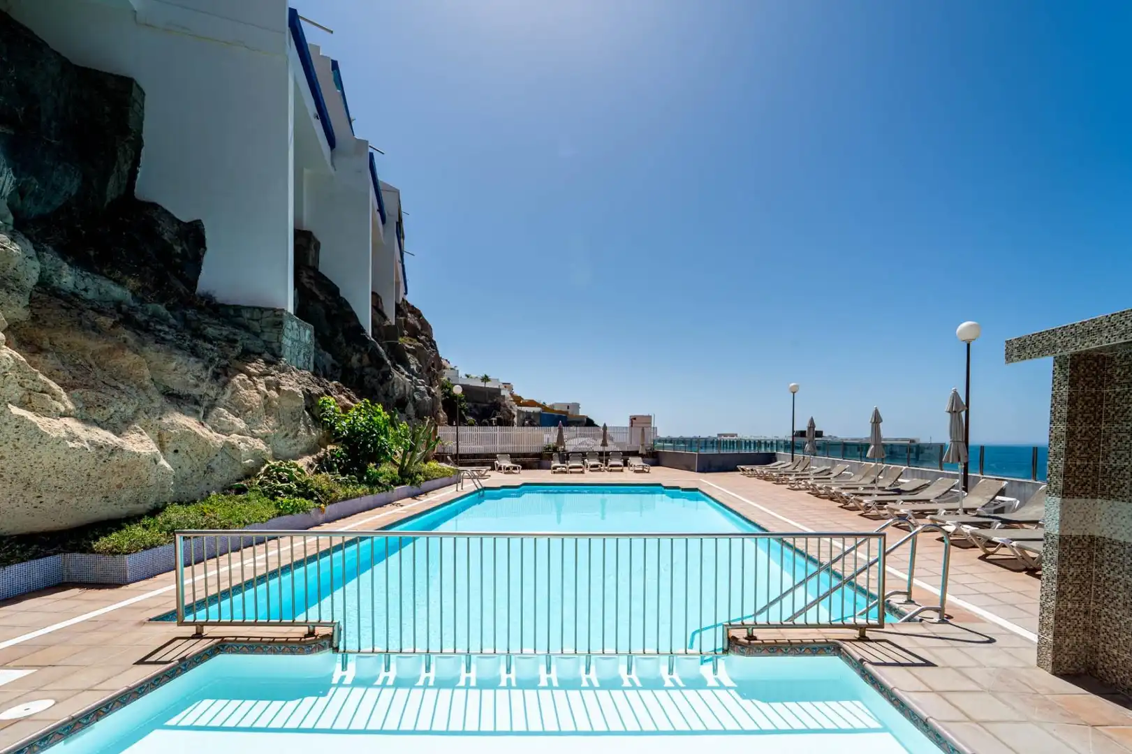 Swimming pool of Apartments for sale in Arguineguín