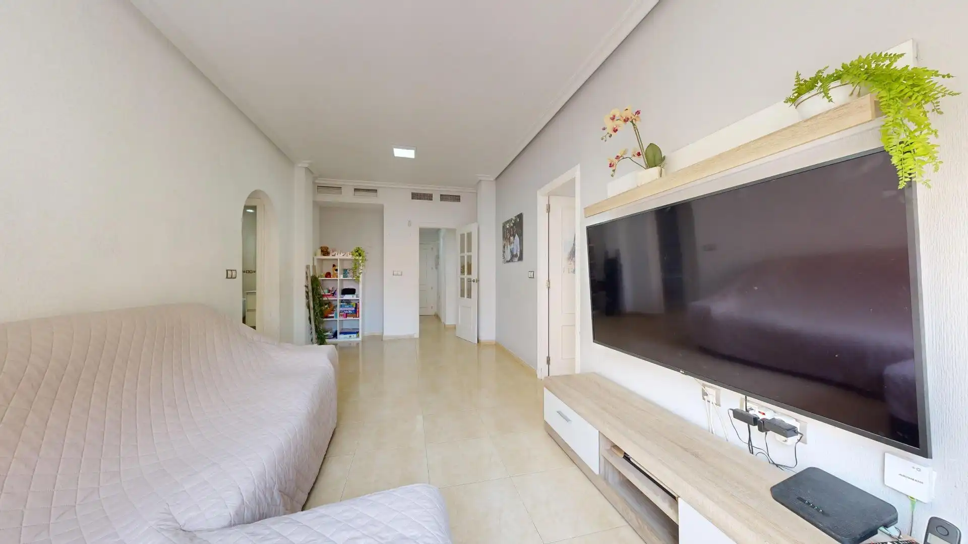 Sala d'estar de Apartament en venda en Los Montesinos amb Aire condicionat, Moblat i Piscina comunitària