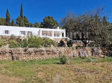 Casa rústica con piscina en venta en Santa Eulària