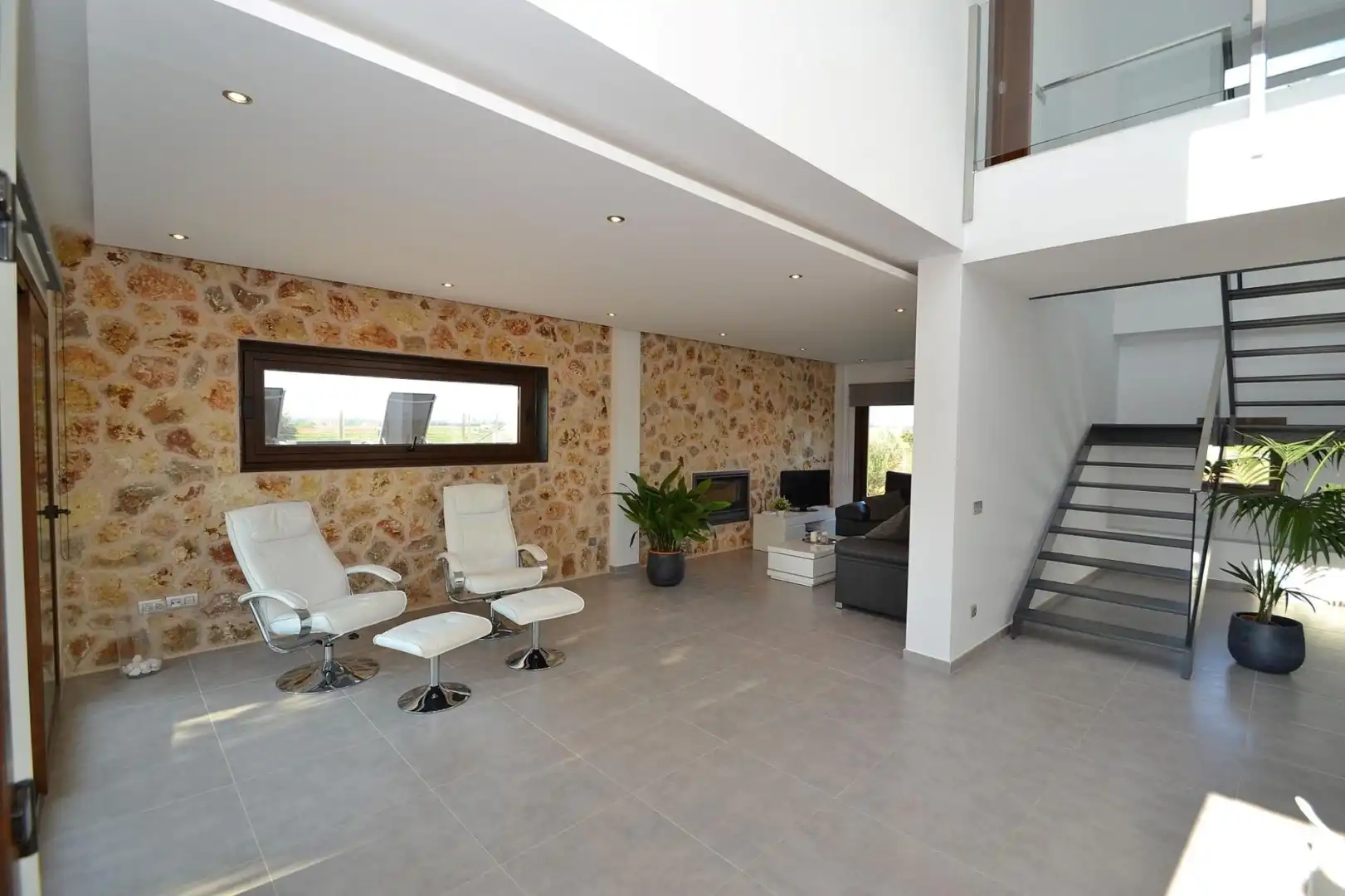 Sala d'estar de Finca rústica de lloguer en Muro amb Aire condicionat, Calefacció i Jardí privat