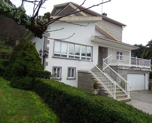 Vista exterior de Casa o xalet en venda en A Lama   amb Calefacció, Jardí privat i Moblat
