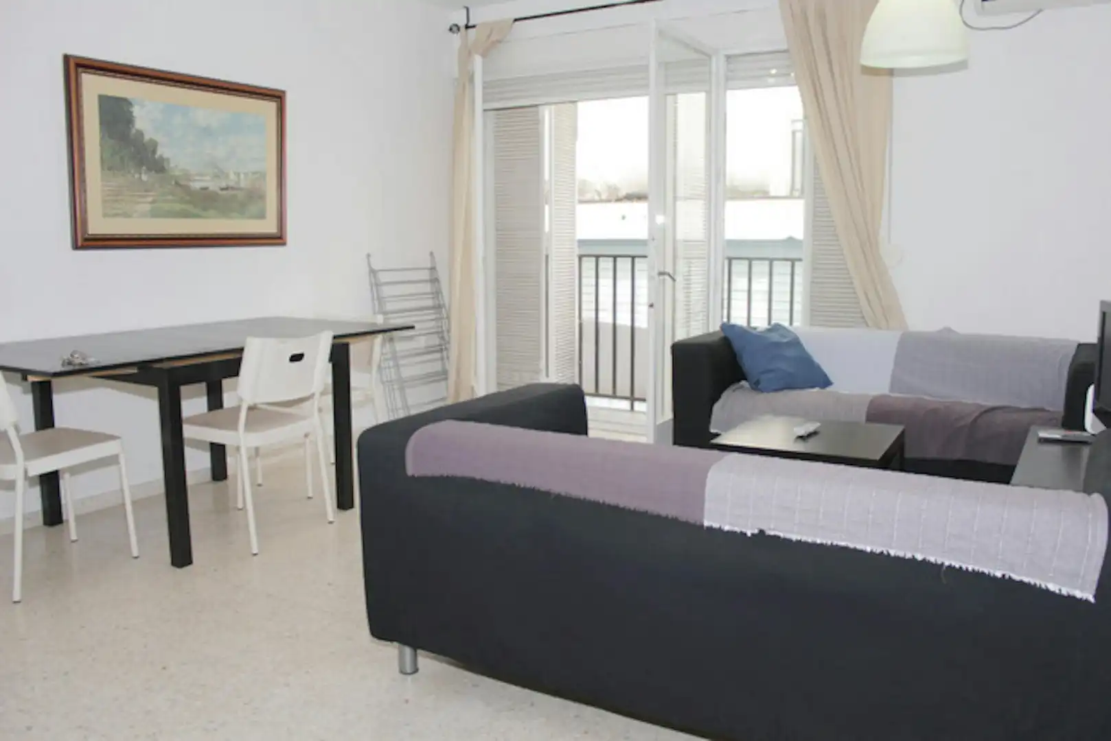 Sala de estar de Piso para compartir en  Sevilla Capital con Aire acondicionado, Amueblado y Lavadora
