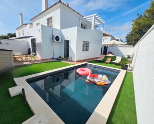 Swimming pool of Single-family semi-detached for sale in Algeciras  with Air Conditioner, Private garden and Swimming Pool